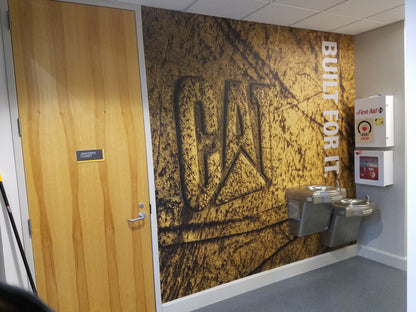 Distressed CAT Logo Mural