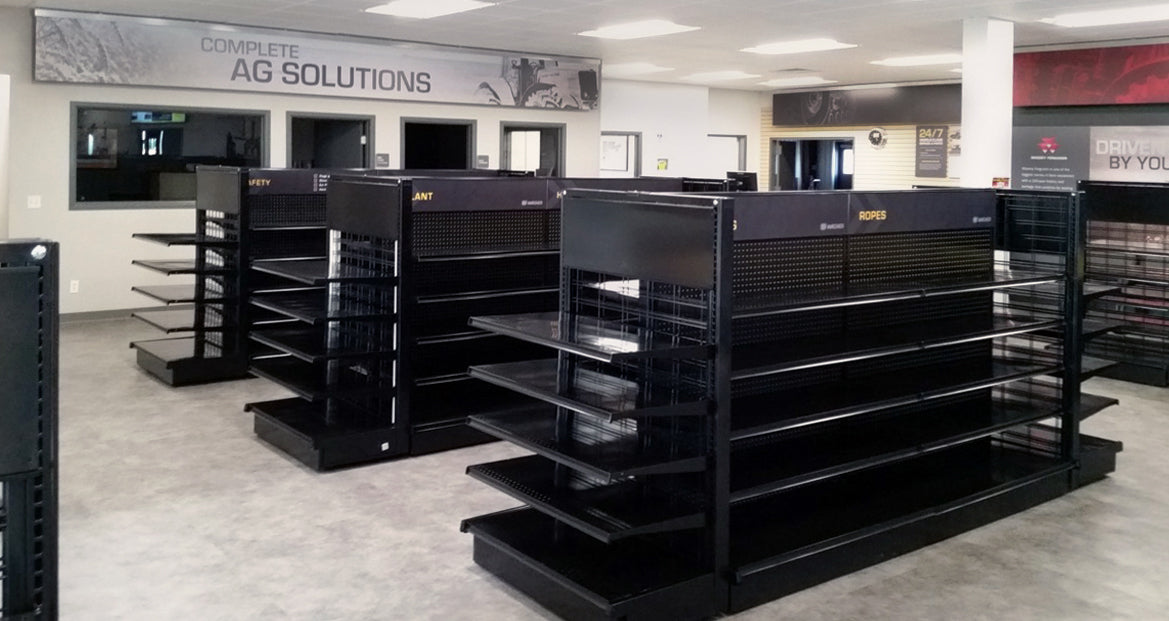 This fixture is a Lozier Showroom shelving unit designed for a Caterpillar or AGCO or Fendt or Massey dealership.