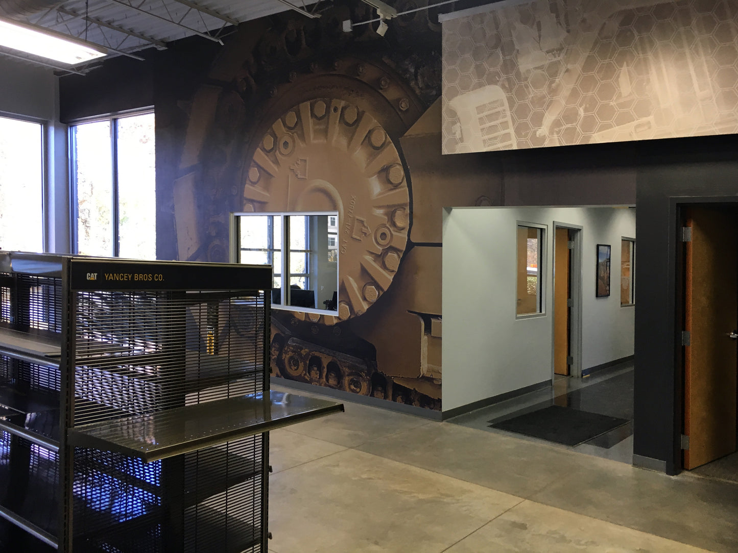 Printed and installed CAT Undercarriage Closeup Mural at Yancey BCP center in Austell, Georgia.