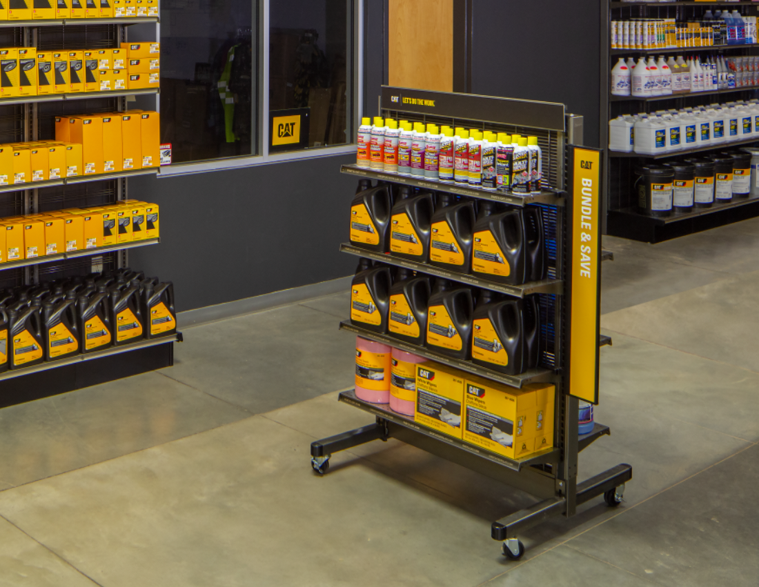 This fixture is a Lozier Showroom shelving unit designed for a Caterpillar or AGCO or Fendt or Massey dealership.