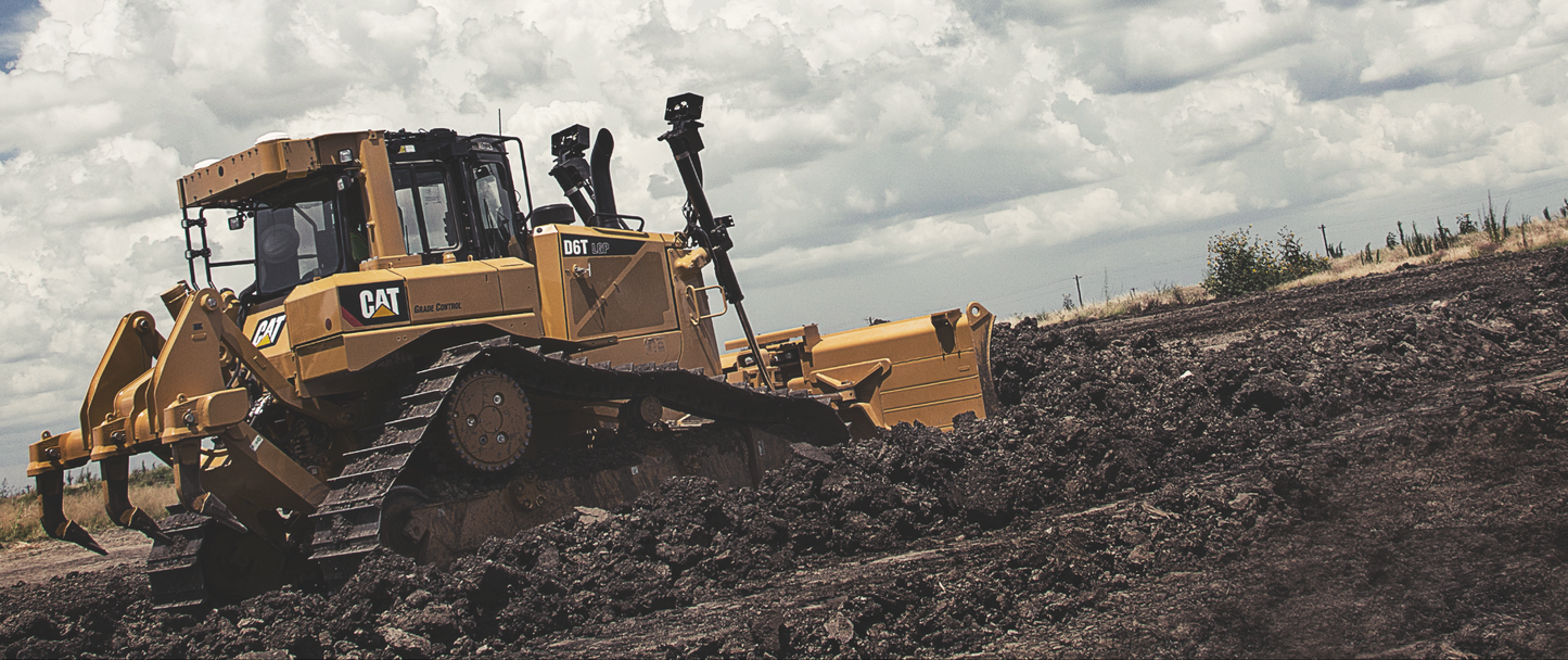 CAT D6T Shoveling Dirt
