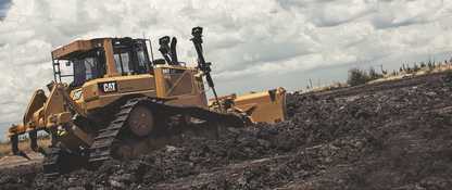 CAT D6T Shoveling Dirt